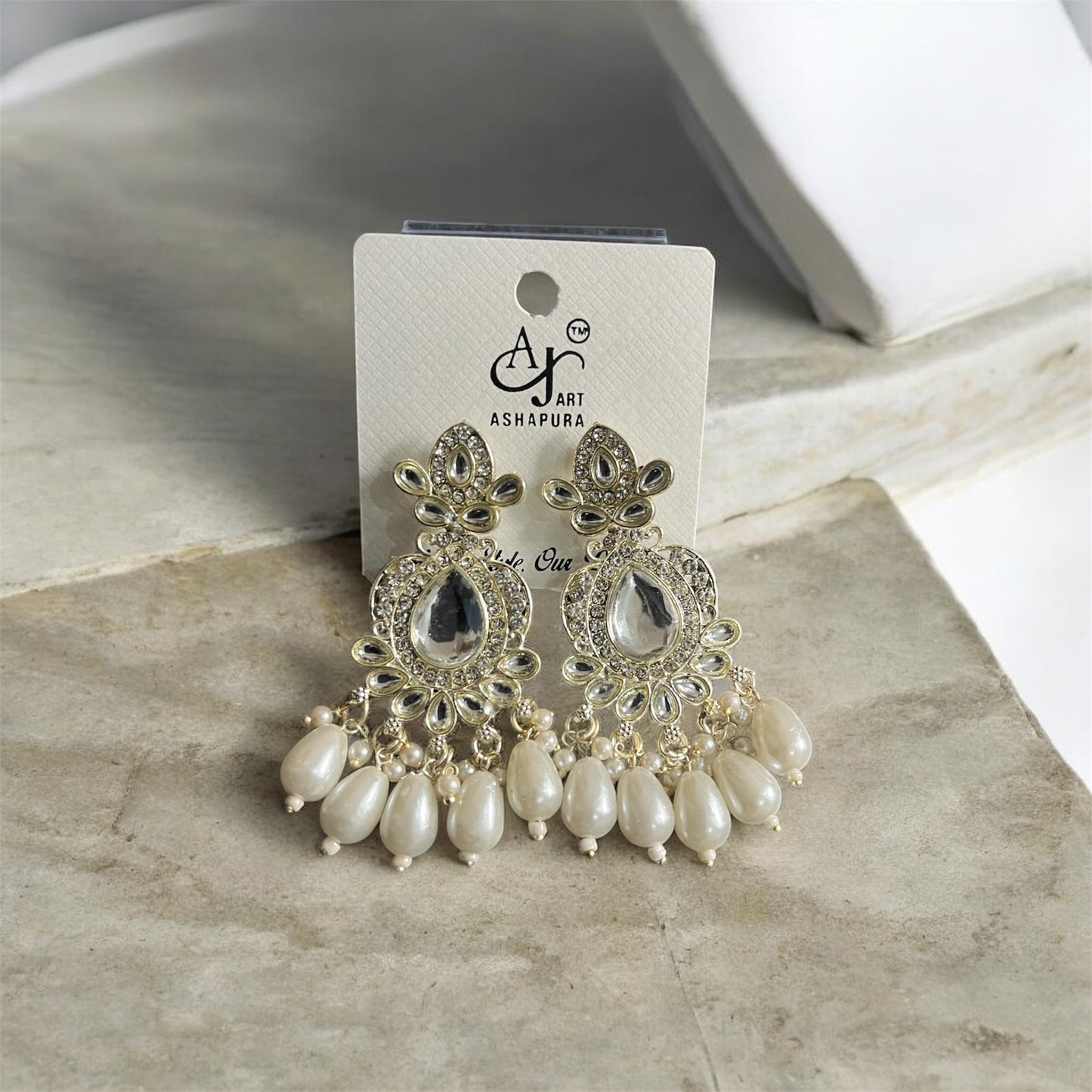small AJ White fancy earring